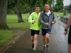Anthony with his guide runner, at Hillsborough Park