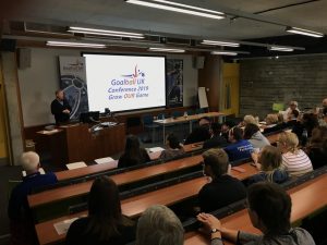 Image shows Goalball UK CEO Mark Winder presenting at the 2019 goalball conference