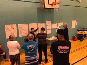 Image shows Faye Dale teaching at the 2019 goalball conference