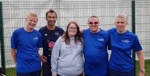 Image shows attendees of the 2019 Goalball UK conference stood with Goalball UK members of staff