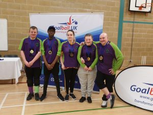 The current Croysutt Warriors Novice Squad, and coach Tommy, at a recent Goalball UK tournament