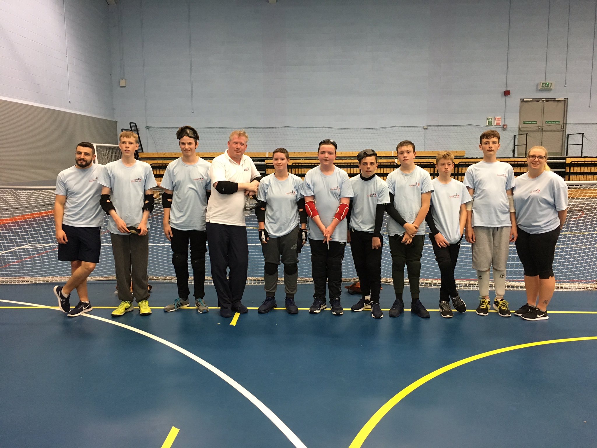 Mark winder stood with the attendees of the 2017 goalball summer camp