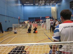 Image is an action shot of a goalball taster session