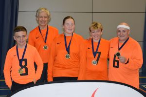 A blast from the past with Croysutt Warriors playing in orange! Tom is far right and Robin is second from the left.