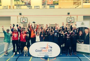 London Cup 2019 group photo with everyones hands in the air smiling in elation!