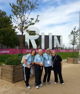 Image shows Judith stood outside the Copper Box arena with friends