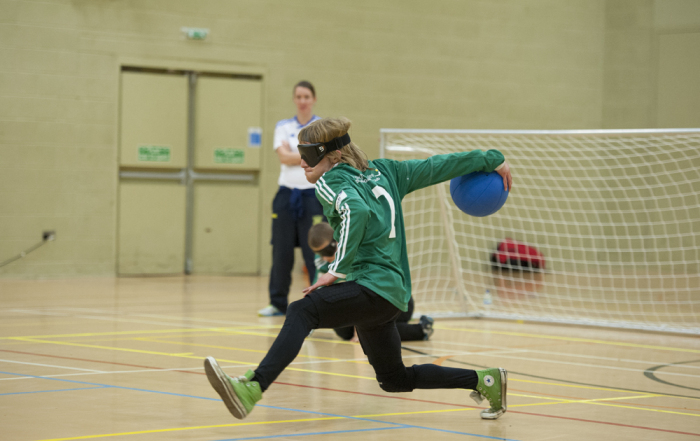 Image of a Goalball player throwing