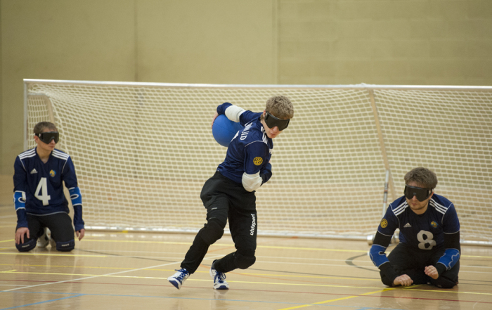 Image of a Goalball player on the attack