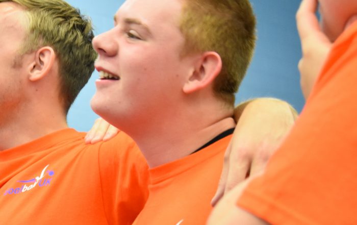 Picture of Chris, smiling, at Summer Camp 2018