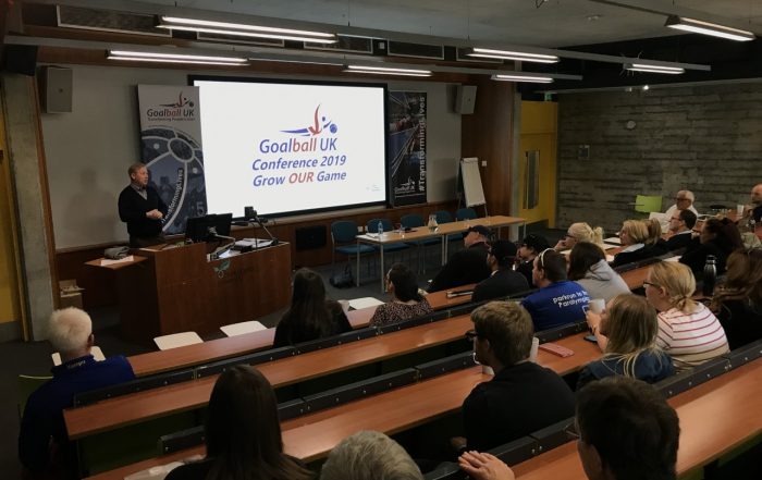 Image shows Goalball UK CEO Mark Winder presenting at the 2019 goalball conference