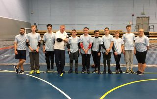 Mark Winder stood with the attendees of the 2017 goalball summer camp