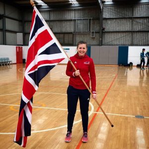 Becky smiling holding the Union Flag