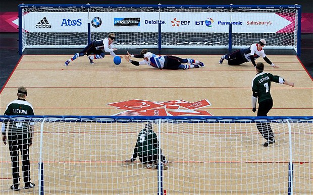 Image shows Great Britain's Michael Sharkey (left), Niall Graham and Adam Knott (right) in action against Lithuania during the Mens's Goalball at the Copper Box in London.