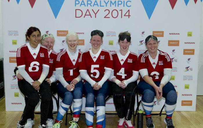 Image is of Team GB goalball Women's players at the 2014 National Paralympic Day celebration