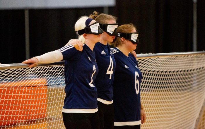 Kali as part of the GB squad, with teammates Georgie and Sarah