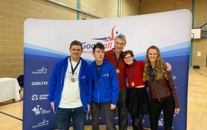 Graham alongside his Cambridge teammates and coach