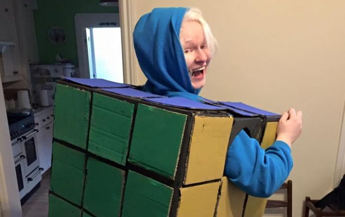 Karina Lang posing in a jazzy Rubik's cube!