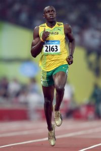 Usain Bolt mid sprint