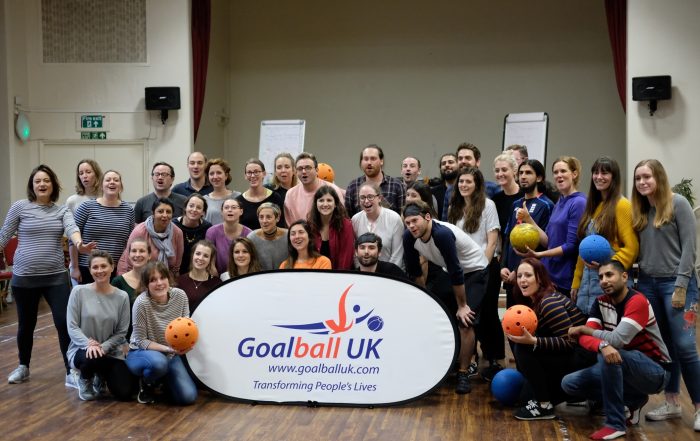 Big group photo at a corporate event. Lots of smiles!