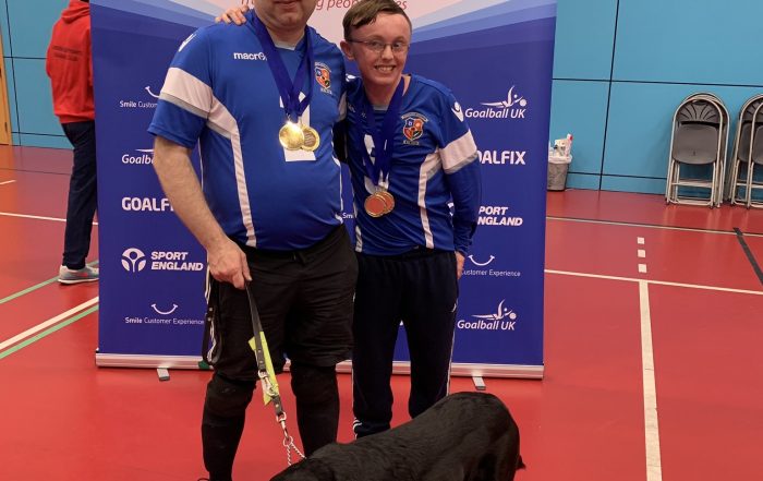 Paul Holloway and Conna Jeffs standing together for a photo post tournament.