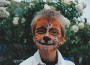 Dom Roper with Tiger faceprint as a youngster. It was meant to be at Fen Tigers!