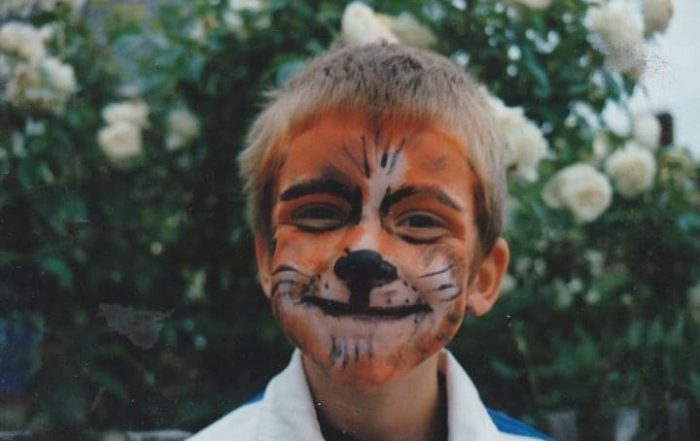 Dom Roper with Tiger faceprint as a youngster. It was meant to be at Fen Tigers!