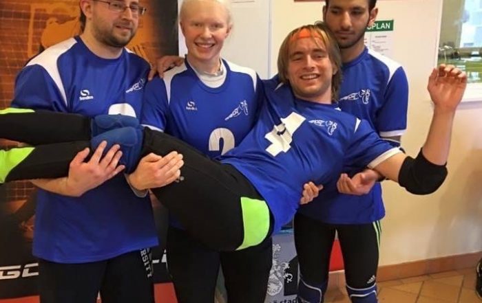 Warren being lifted by the rest of the Cambridge Intermediate team. Warren appears to be loving it!