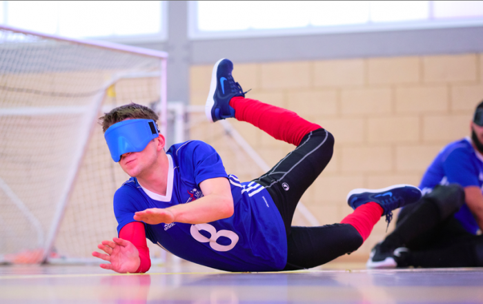 Joe Roper saving a shot wearing blue Goalfix eyeshades!