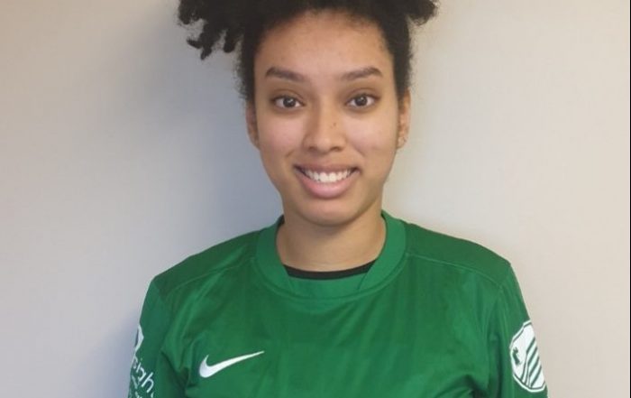 Image shows Aneesah stood smiling at the camera in her Nottingham Sheriffs uniform