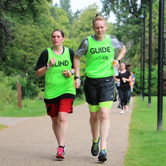 Image shows Gemma mid run with her guide runner