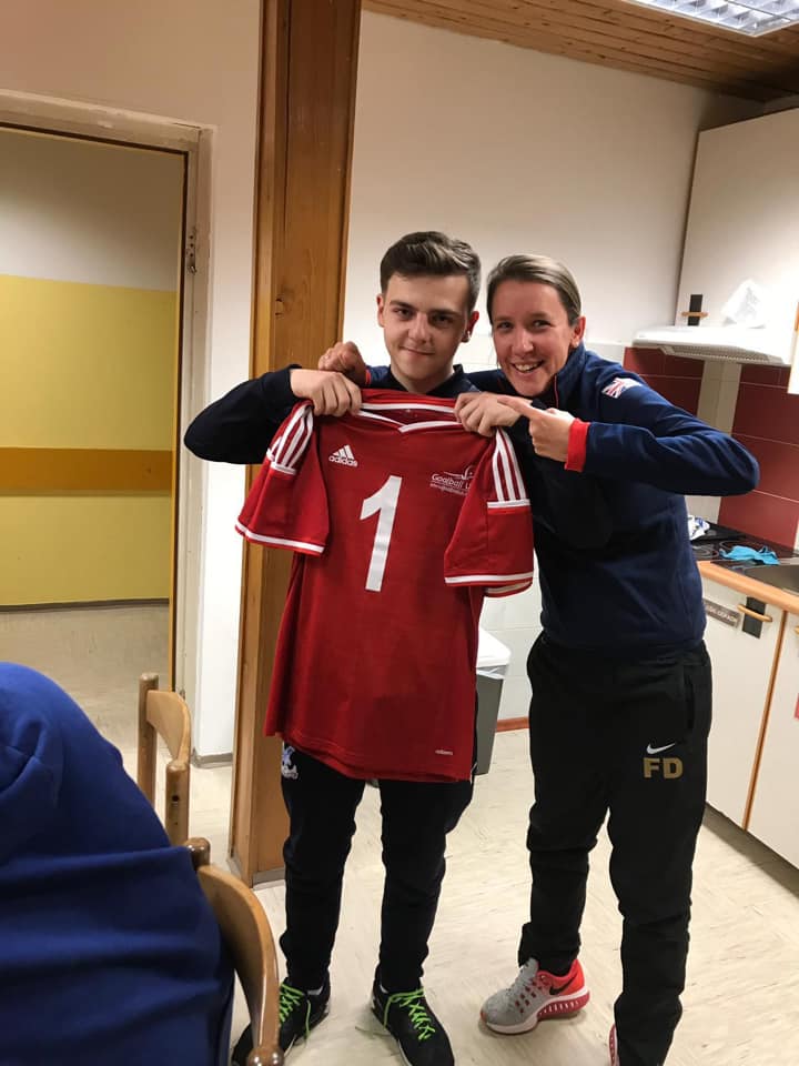 A proud moment for Jack holding his GB top with Head Coach Faye Dale.