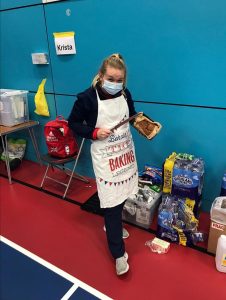 Jodie Redgrave at a Great Britain Camp showing off her baking skills.