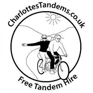 Charlotte's Tandem logo which is a tandem riding through a valley with the sun shining
