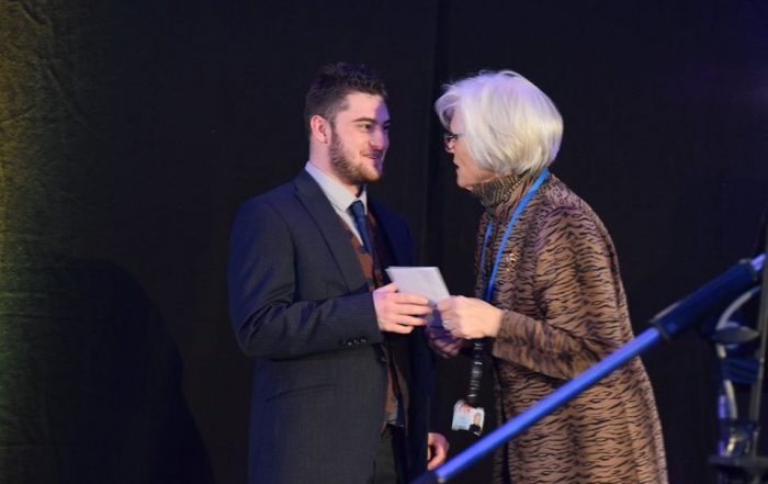 Ciaron Naughton receiving the Prince of Wales award.