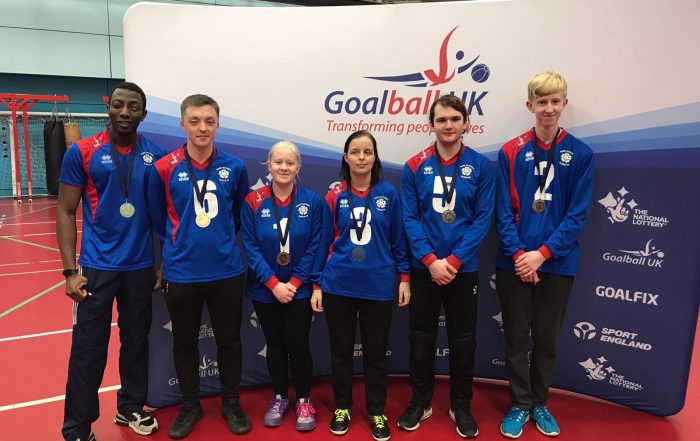Faith Johnson stood in a South Yorkshire group photo at a north region tournament in Sheffield.