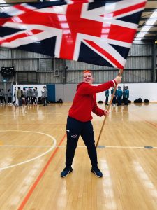 Meme Robertson waiving the Great Britain flag at the 2019 Under 19 World Championships!
