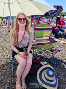 Holly Graham sat on a chair with sun in the background!