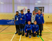 Birmingham Goalball Club Novice team gold medal photo in their snazzy blue tracksuits.