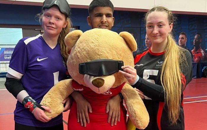 Chelsea Hudson, Yusuf Huraira, and Sam Gough with Dale the bear!