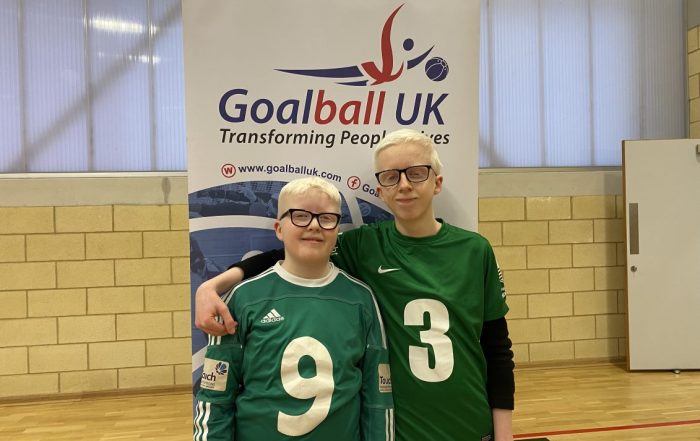 Max and Harry Boden standing together with their arms around each other after competing at their first tournament together.