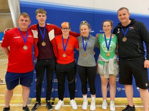 RNC Academy Goalfix Cup 2022 team photo with their bronze medals. Left to right: Assistant coach Chris, Stuart, Meme, Megan, Antonia, and head coach Aaron.