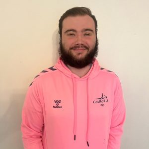 Max in his pink Youth Forum hoodie