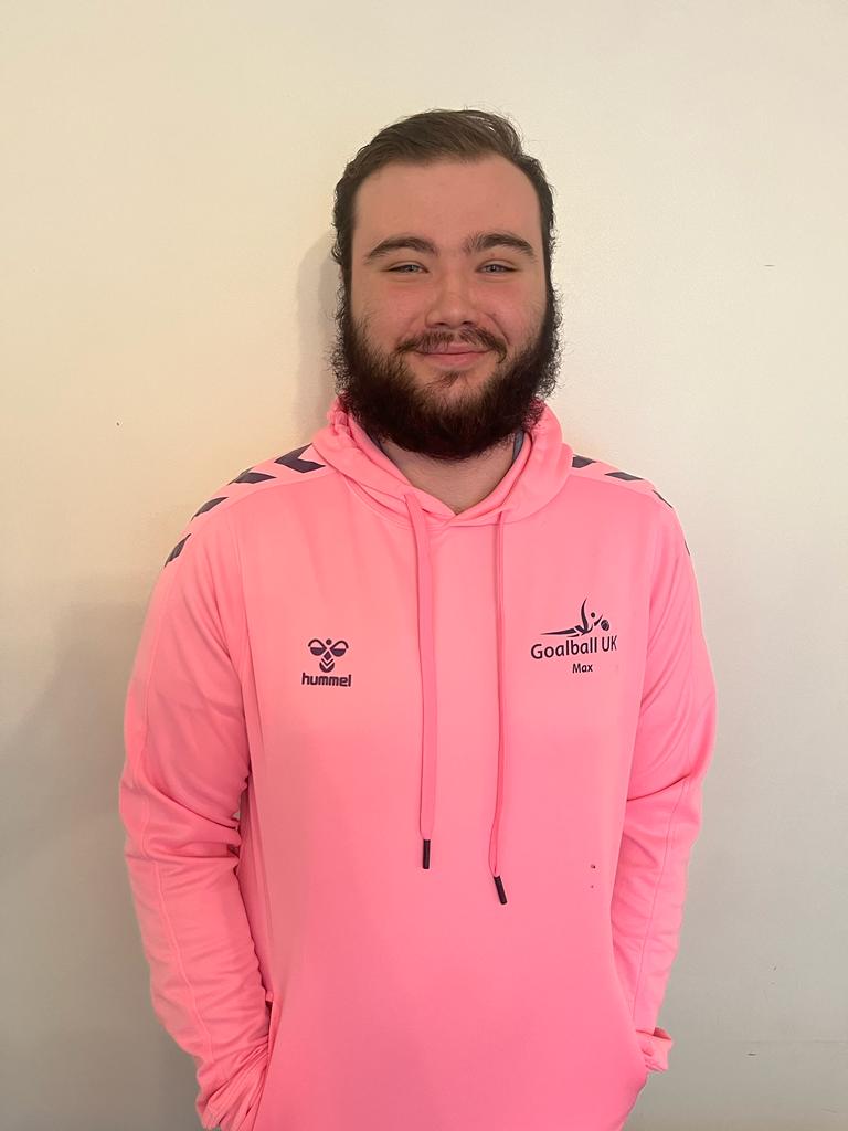 Max in his pink Youth Forum hoodie