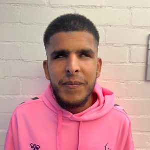 Yusuf in his pink Youth Forum hoodie