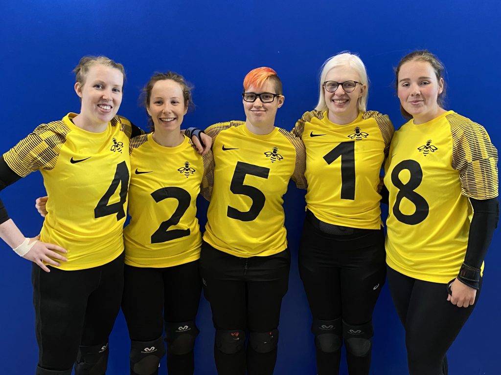 Queen Bees goalball team in their yellow team tops. L-R is Georgie, Antonia, Meme, Sarah and Lois