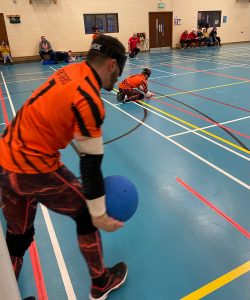 Dan Roper preparing to throw a goalball on the right wing whilst playing for Fen Tigers.
