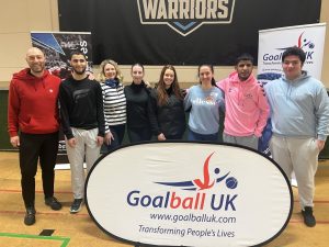 Glasgow School Leaders course with all of the participants standing together in front of a white Goalball UK pop up banner.