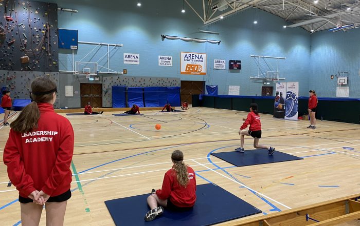 A Goalball UK leadership course is underway with participants on the mats