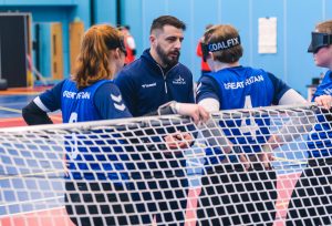 Dan talks to GB Women during a time out at GB training camp
