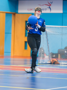 GB's Chelsea Hudson smiles with the goalball during a training session